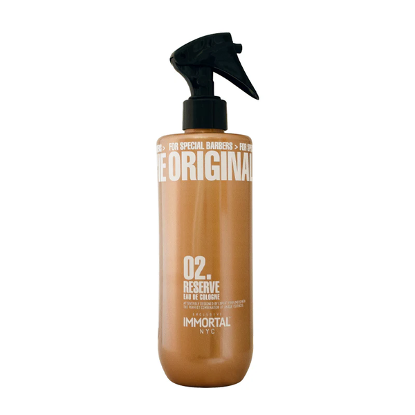 Bottle of Immortal NYC hair product on a white background