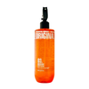 Orange immortal after shave bottle with black pump on a white background