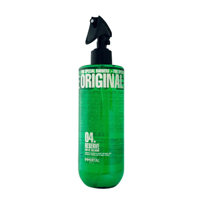 Green bottle with black spray nozzle on a white background
