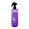 Purple immortal after shave bottle with black spray nozzle on a white background