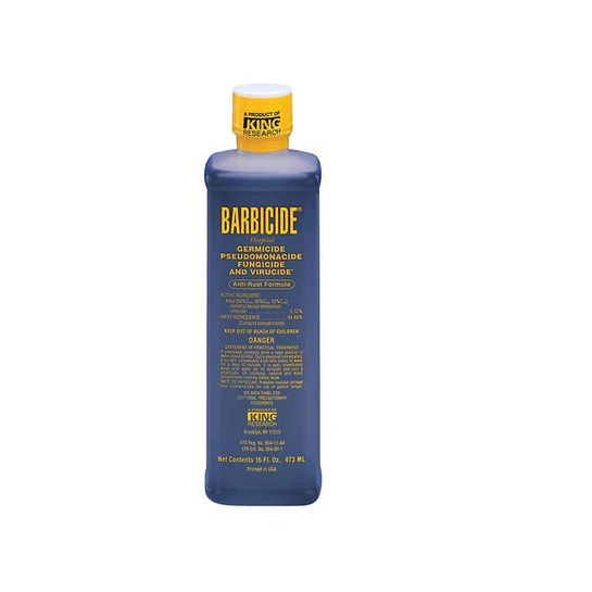 Barbicide bottle on a white background
