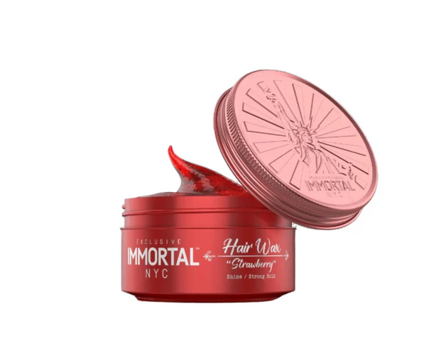 Red container of Immortal NYC strawberry hair wax with pink lid on a white background
