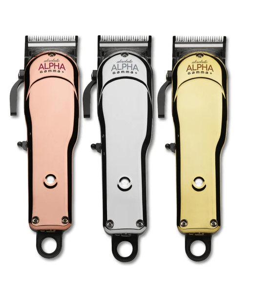 Three hair clippers in rose gold, silver, and gold on a white background