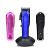 Set of grooming tools including a blue clipper, pink trimmer, and black lids on a white background.