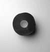 Black roll of 'L3VEL3' neck strips on a light gray background