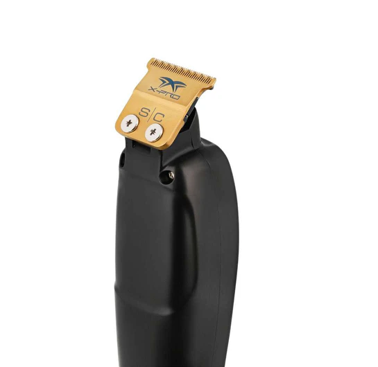 Black hair clipper with gold comb on a white background
