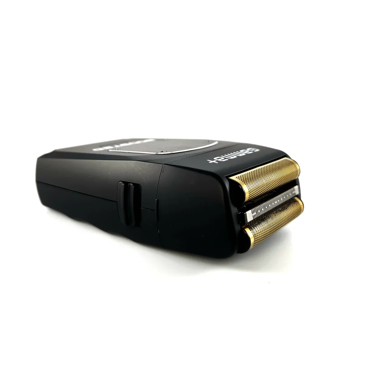 Black and gold electric shaver on a white background