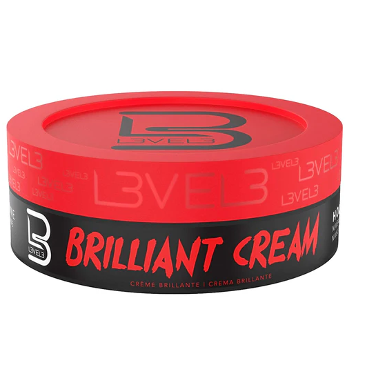 Red and black container of Level 3 Brilliant Cream on a white background