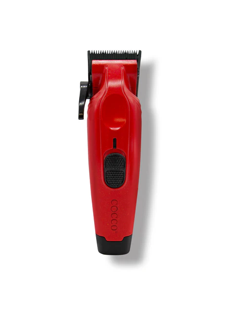 Red hair trimmer with black accents on a white background