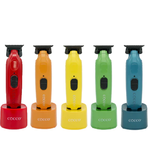 Five colorful COCCO grooming tools on a white background