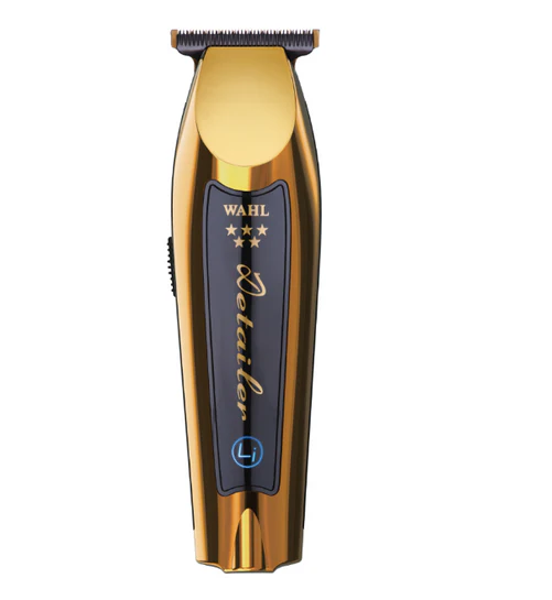 Gold and black Wahl Detailer trimmer on a white background