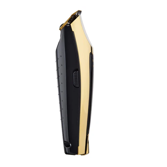 Black and gold hair trimmer on a white background
