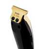 Wahl hair clipper with gold top and black body on a white background
