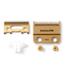 Gold hair clipper comb set with 'BaBylissPRO' branding on a white background