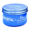 Blue jar of Immortal NYC Fiber Cream Pomade on a white background