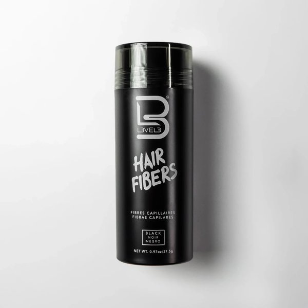 Black container of Level 3 hair fibers on a white background