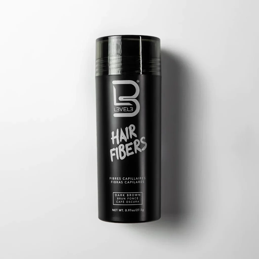 Black container of Level 3 hair fibers on a white background