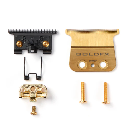 Gold and black grooming tool parts on a white background, including a gold blade with 'GOLDFX' branding.