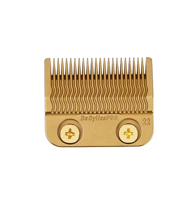 Gold hair clipper comb on a white background