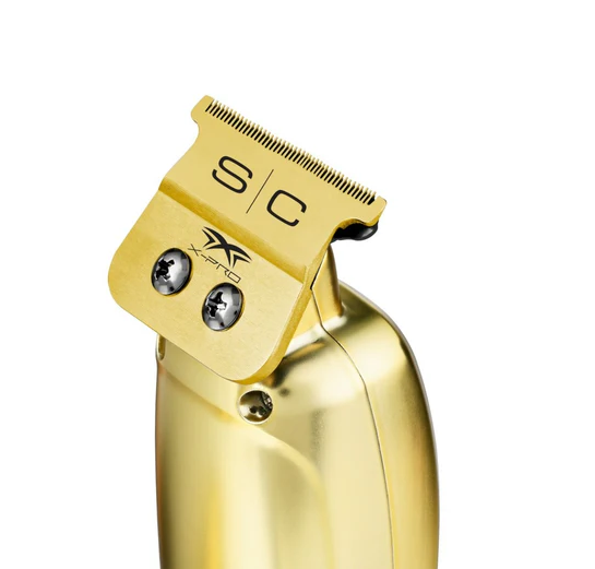 Gold hair clipper with 'SC' branding on a white background