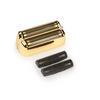 Gold electric shaver head with two black replacement heads on a white background