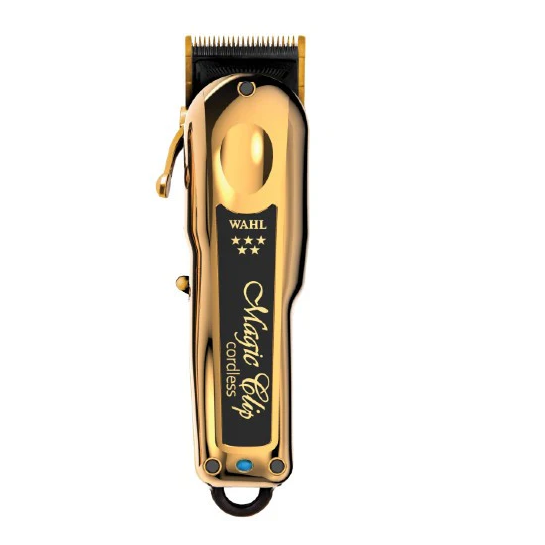 Gold and black Wahl hair clipper on a white background