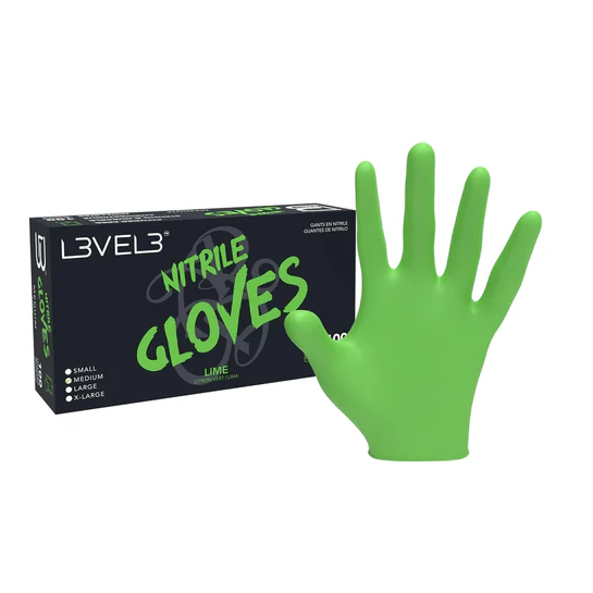 Green L3VEL3 nitrile glove next to its packaging on a white background