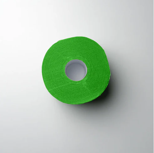 Green roll of 'L3VEL3' neck strips on a light gray background