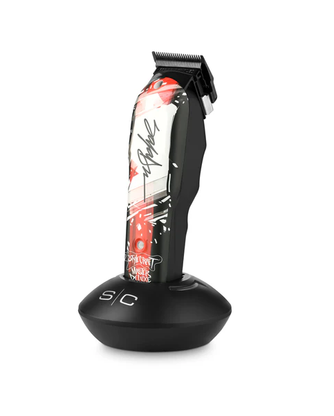 Hair trimmer with floral design on the handle against a white background