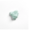 Clump of light green Rolda menthol and mint shaving cream on a white background