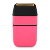 Pink and black electric shaver on a white background