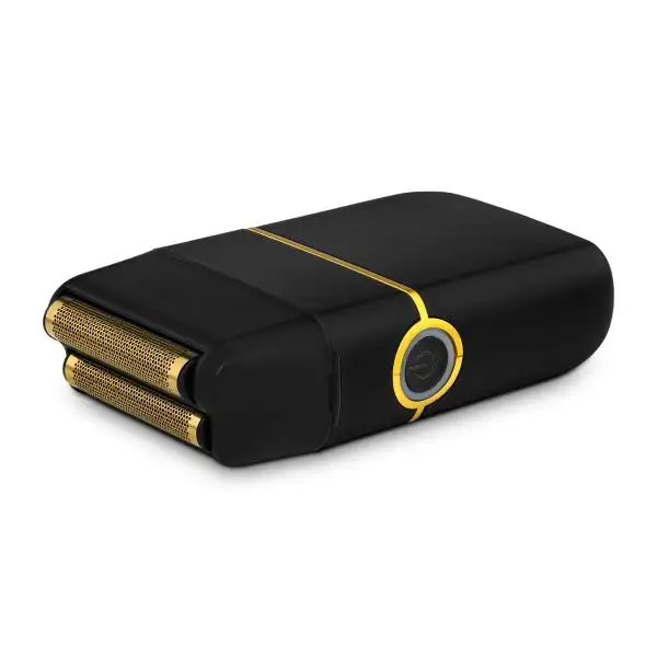 Black and gold electric shaver on a white background