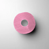 Pink roll of 'L3VEL3' neck strips on a light gray background