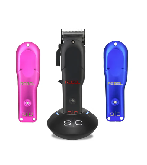 Three hair clippers in pink, black, and blue on a white background