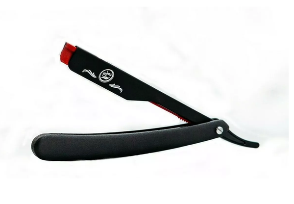 Black Rolda straight razor with red accents on a white background