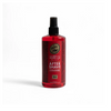 Red bottle of after-shave cologne on a white background