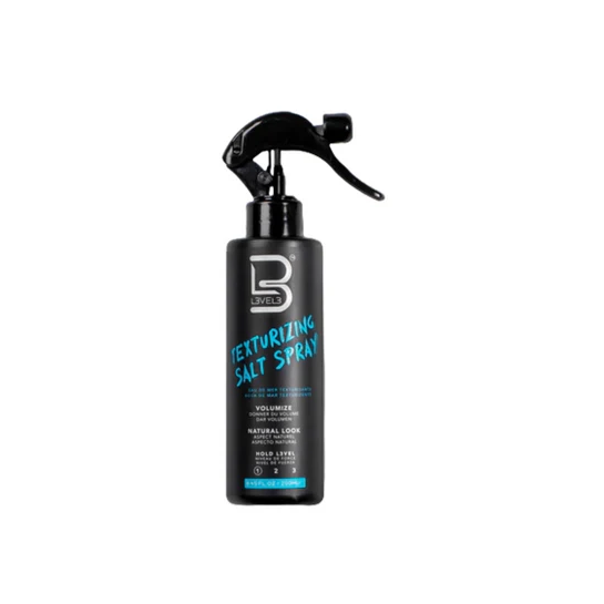 Black spray bottle labeled 'L3VEL3' with ' texturizing salt spray' text on a white background