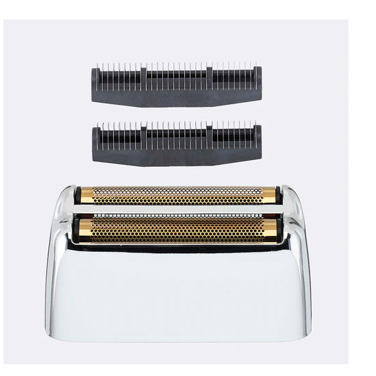 Electric shaver head with clear base and gold contact plate on a white background