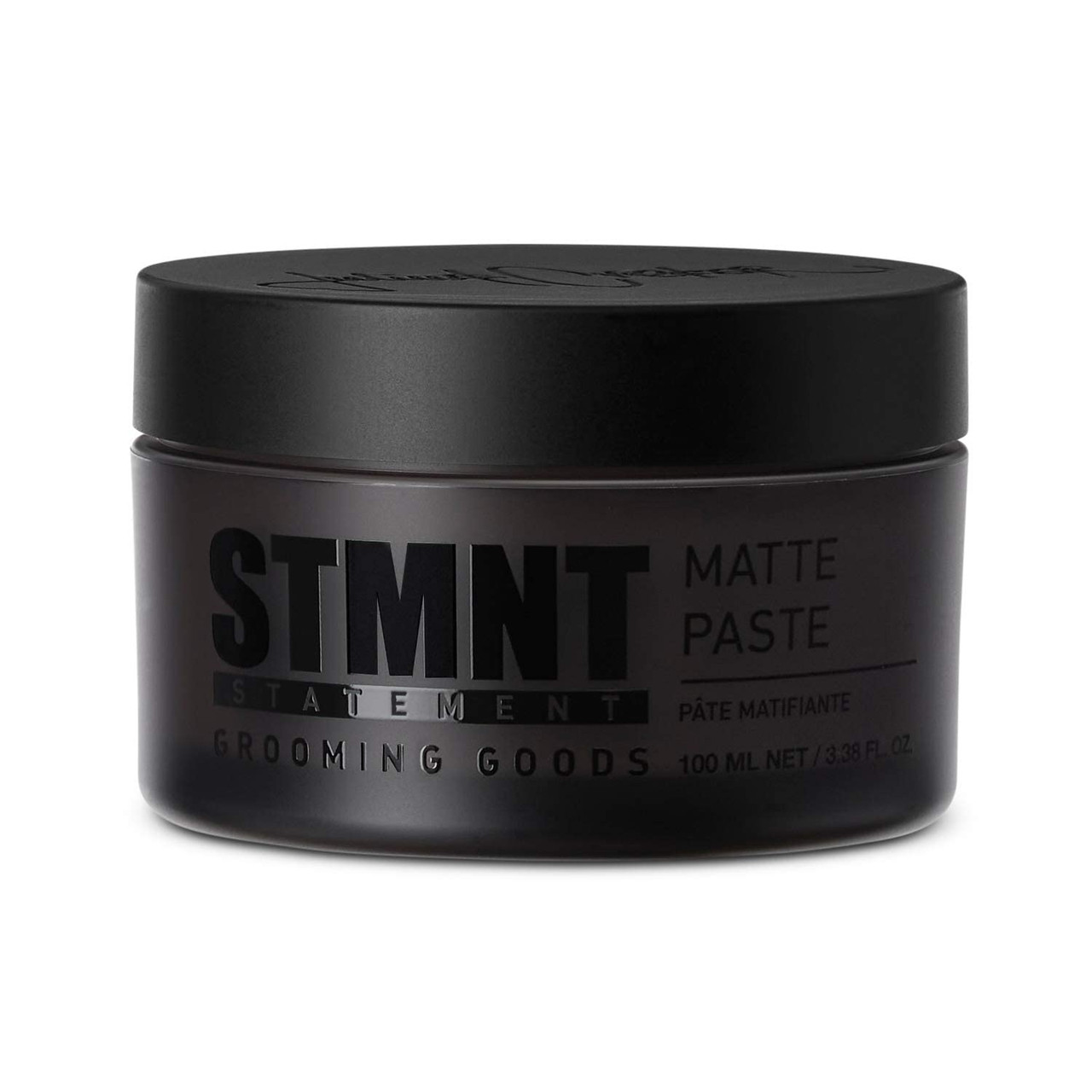 Black jar of STMNT Matte Paste by Statement Grooming Goods on a white background