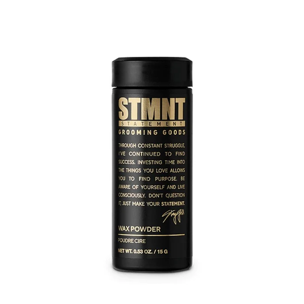 Black container of STMNT Grooming Goods wax powder on a white background