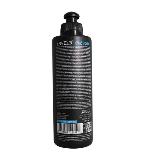 Black bottle of Level 3 Hair Tonic on a white background
