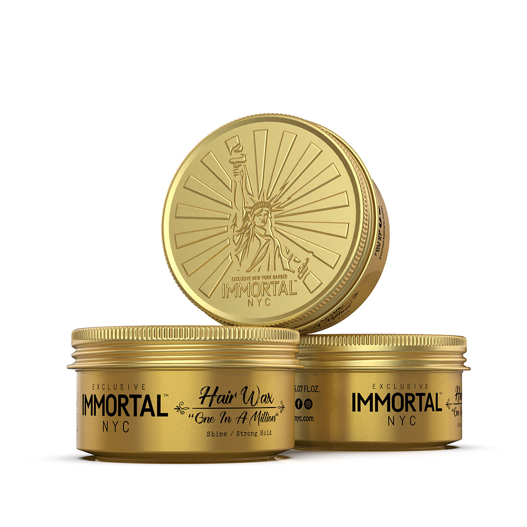 Two gold jars of Immortal NYC hair wax on a white background